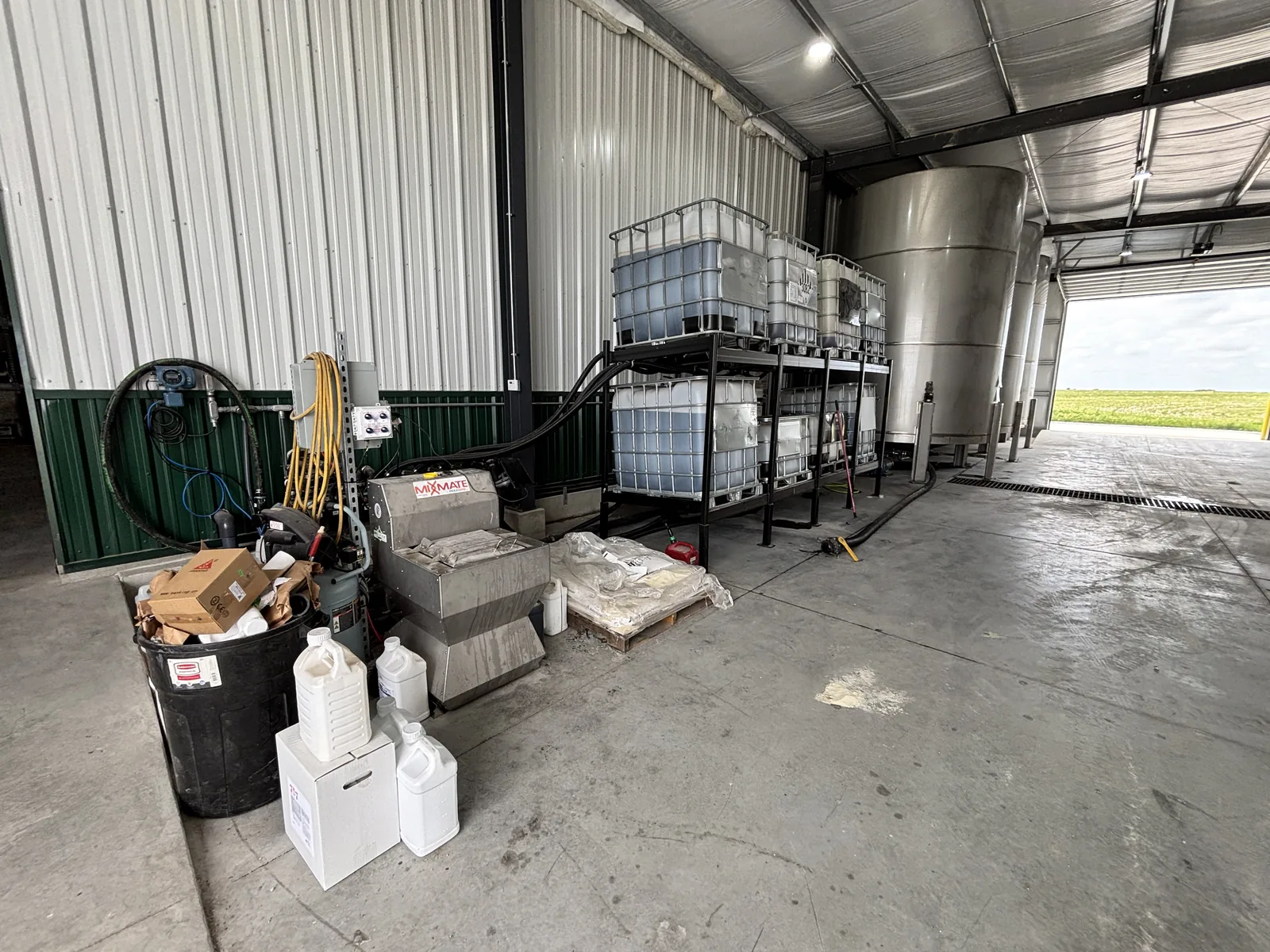 Pro Inductor plant with tote racking and stainless bulk tanks
