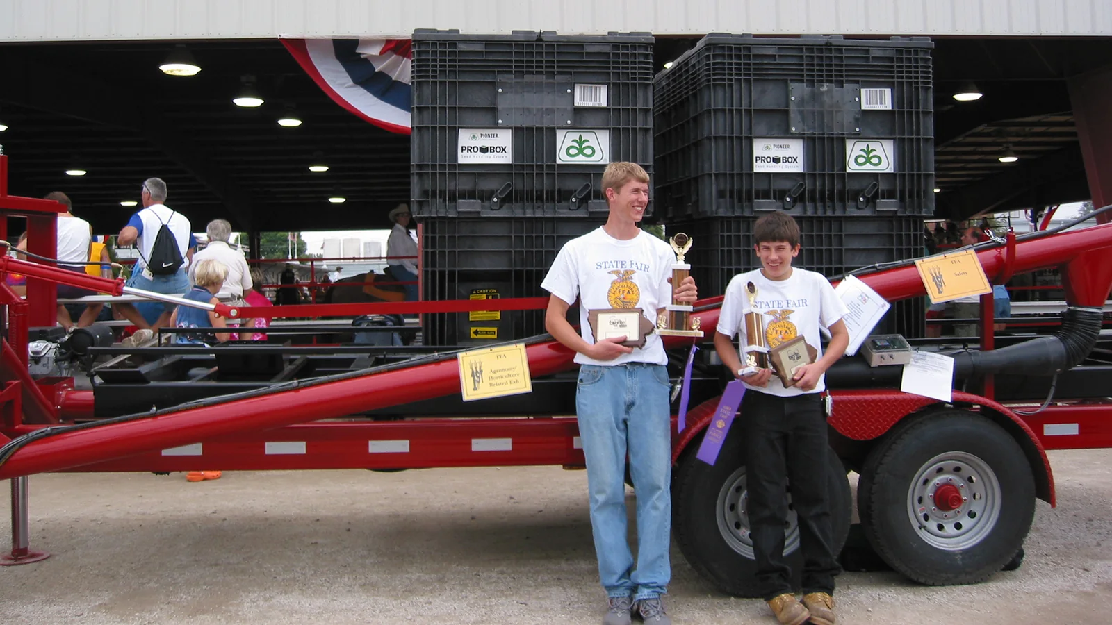 Brent and Luke Applegate with the seed tender at the 2005 Iowa State Fair