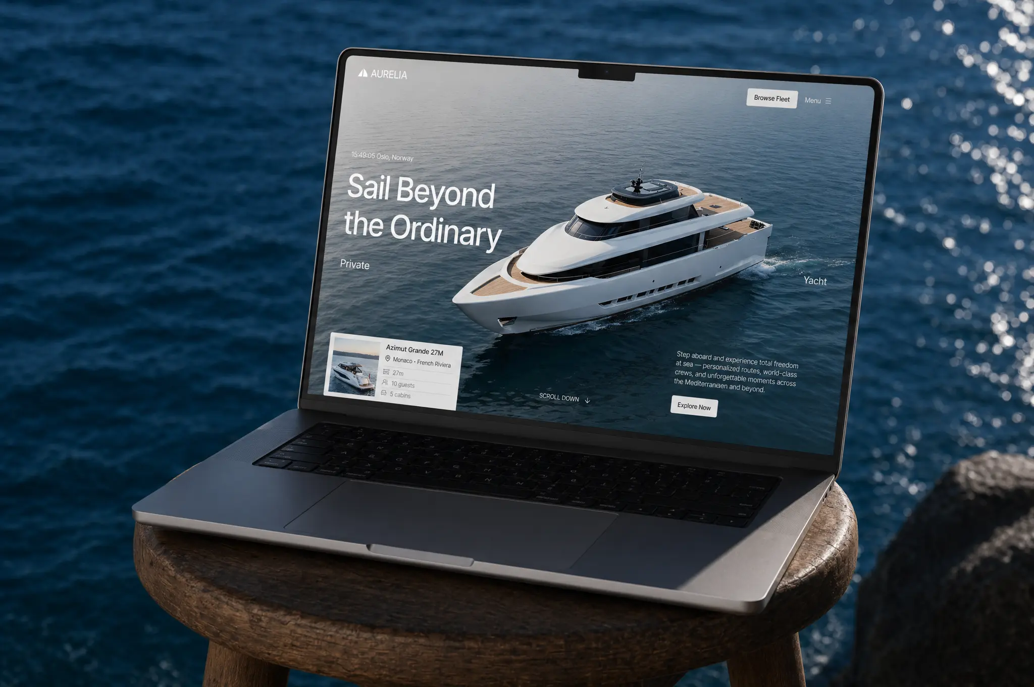 Open laptop on a wooden stool by the water displaying a yacht rental website with a white yacht on the screen.