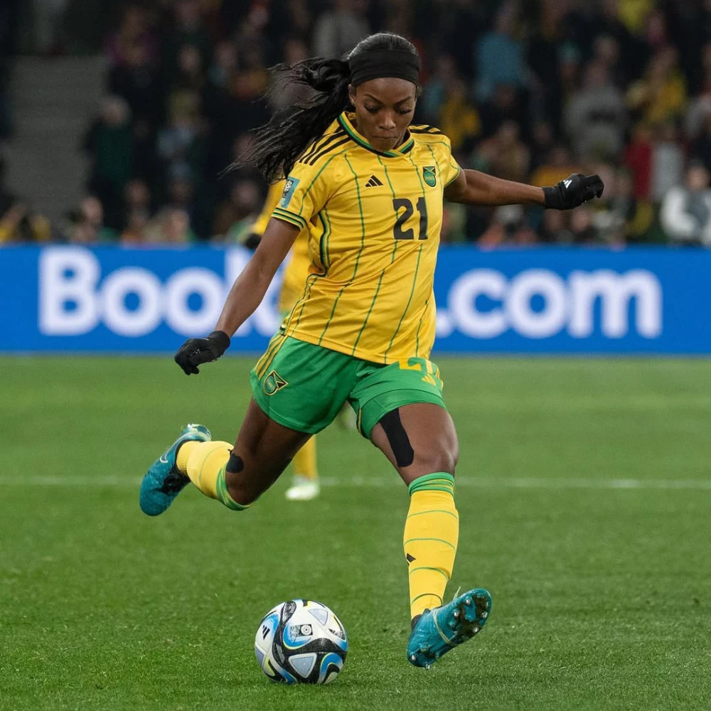 Cheyna Matthews is shown mid-kick while playing soccer for team Jamaica