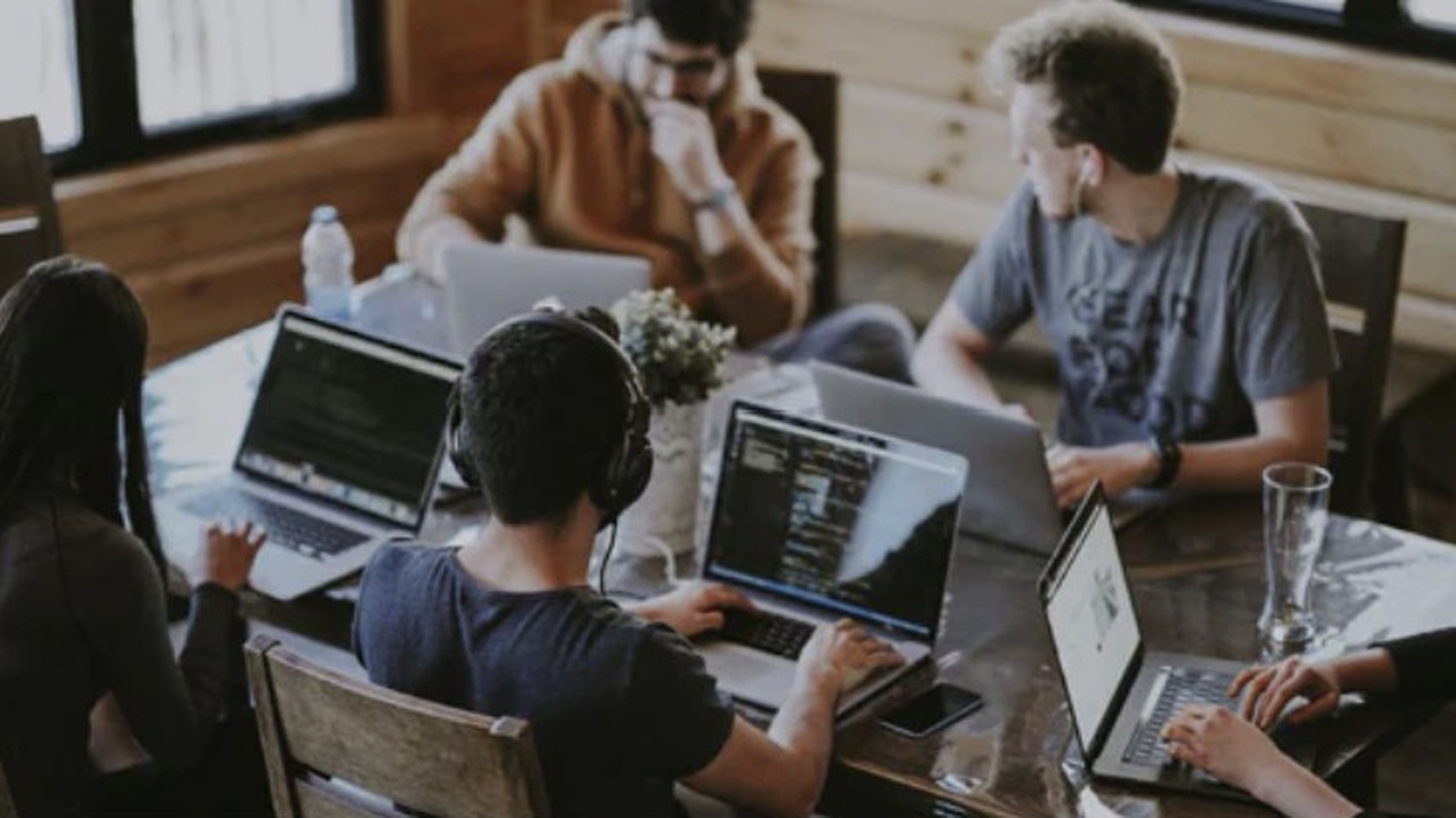 image of a team collaborating at an ai saas company