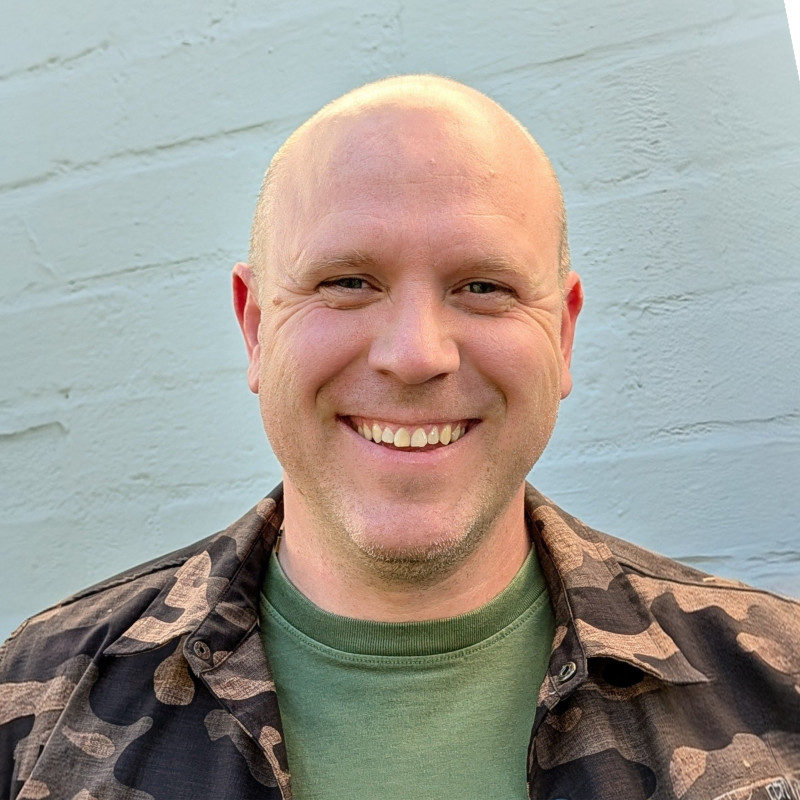 Headshot of TV’s John Smith