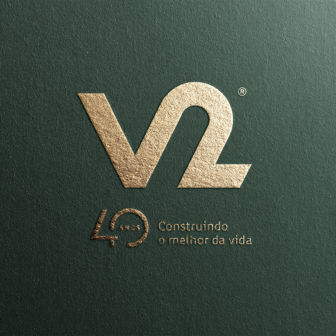 Logotipo e identidade visual da V2 Construções de Maceió