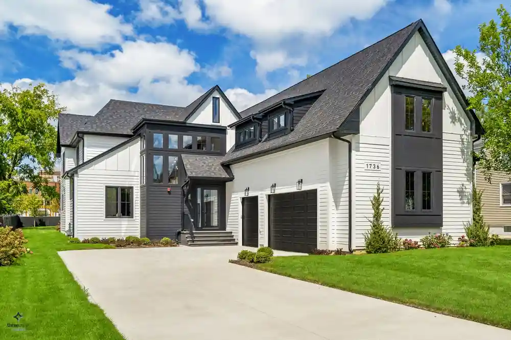 Two-story exterior with board-and-batten siding and dark trim, Alice New Construction in Northbrook, IL