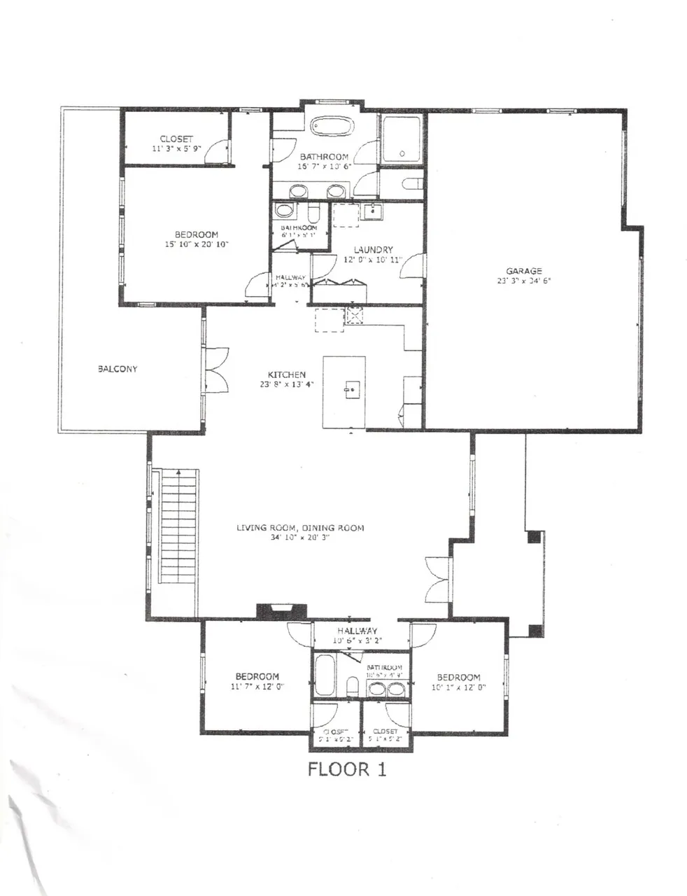 Floor plan diagram of the main level, detailing bedrooms, kitchen, and garage layout.