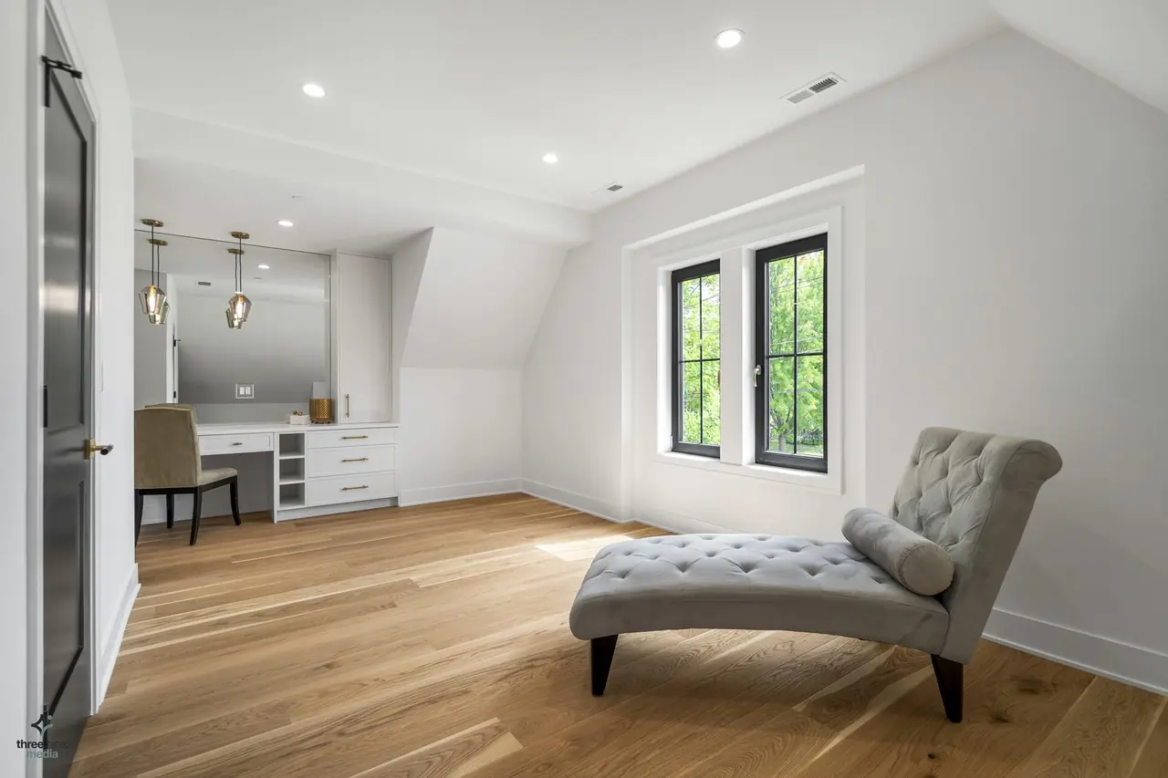 Bonus sitting area with a built-in vanity nook and chaise lounge