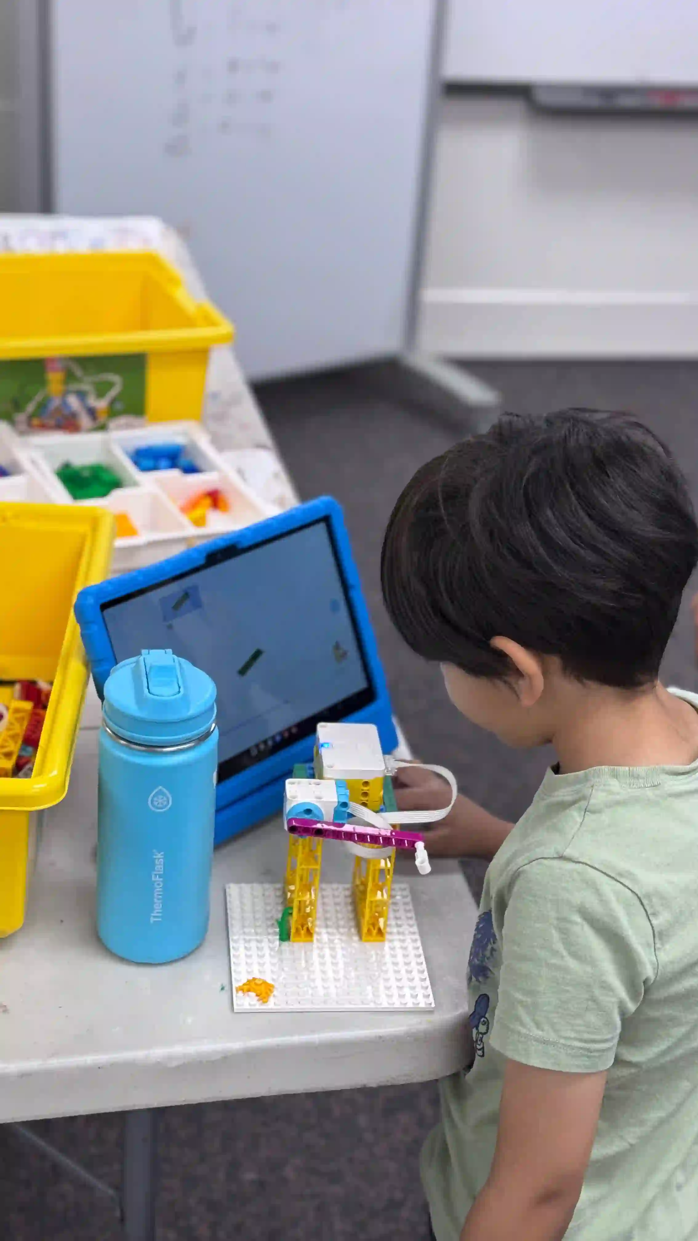 A child learning on his ipad