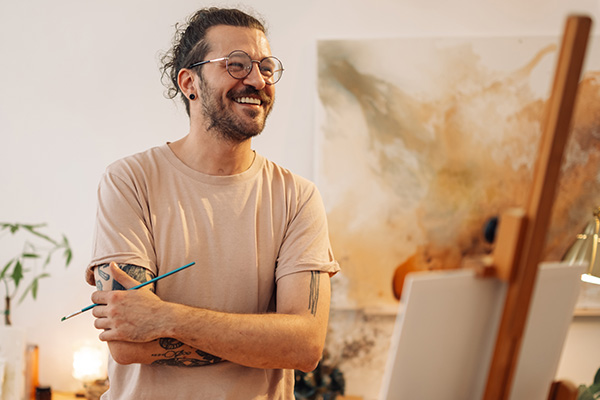 Man painting as a form of therapy