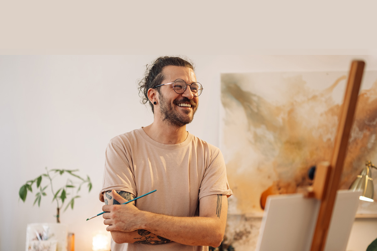 Man painting as a form of therapy