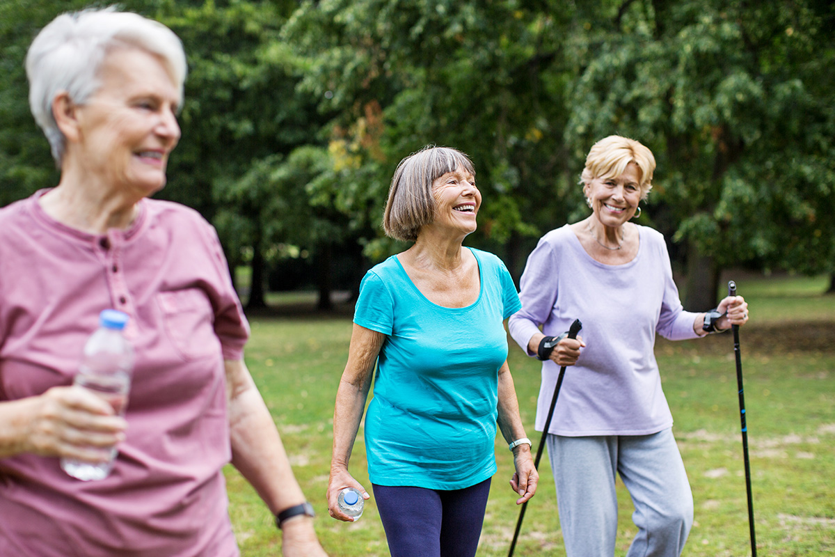 Three senior ladies enjoy exercise outdoors 