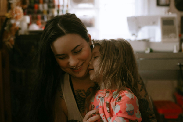 Content mother caring for her young child