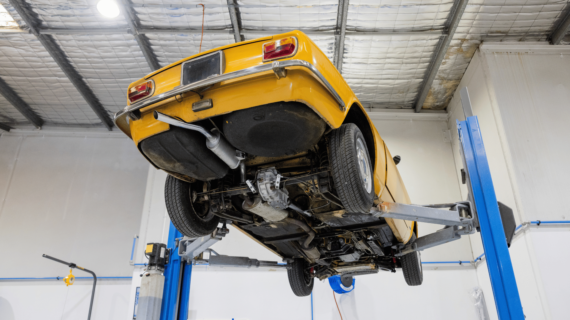 EV Hybrid Smash technician working on electric vehicle repair, Osborne Park
