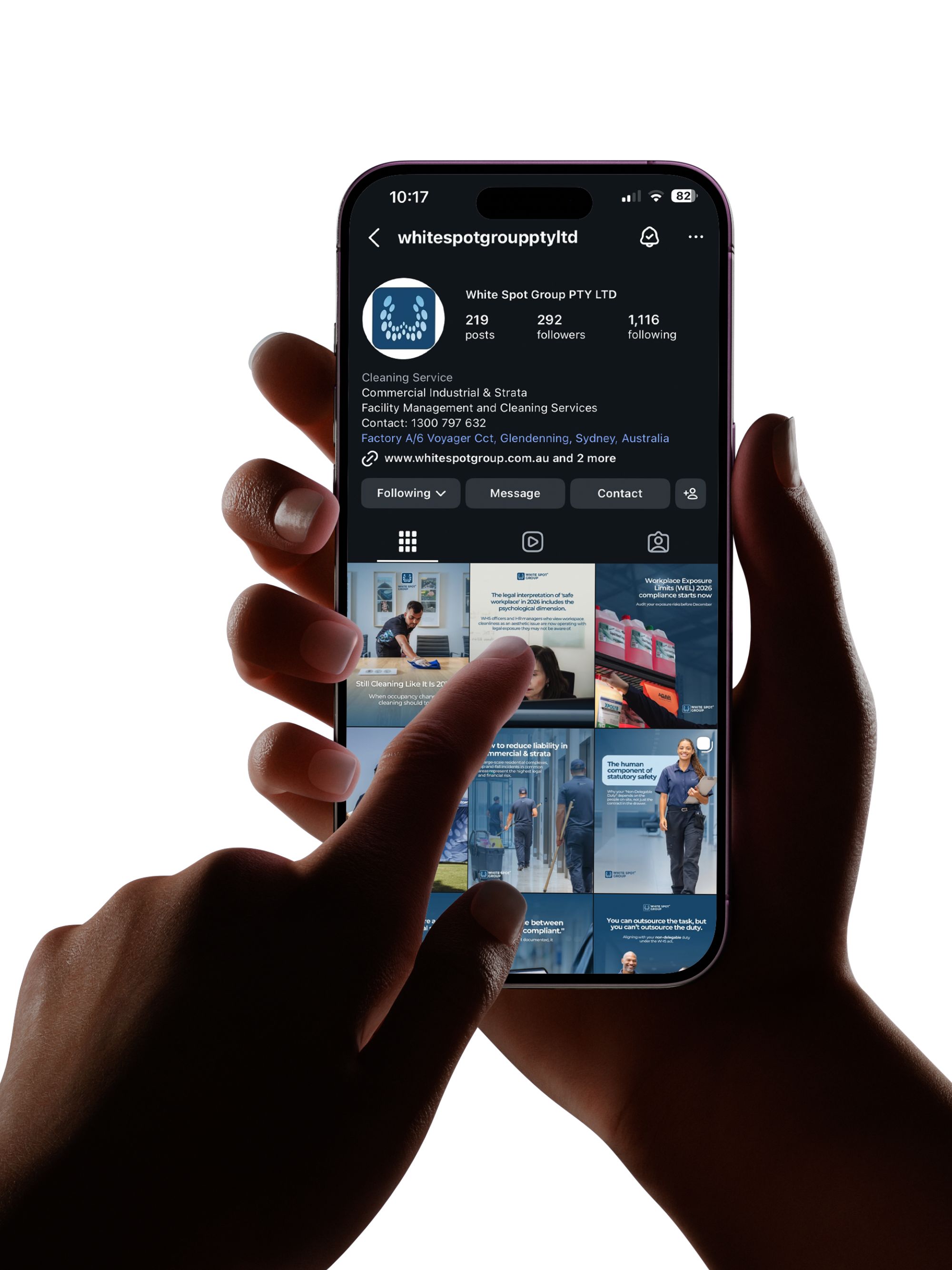 Hand holding smartphone displaying Instagram profile of White Spot Group PTY LTD, a cleaning service company based in Sydney, Australia.
