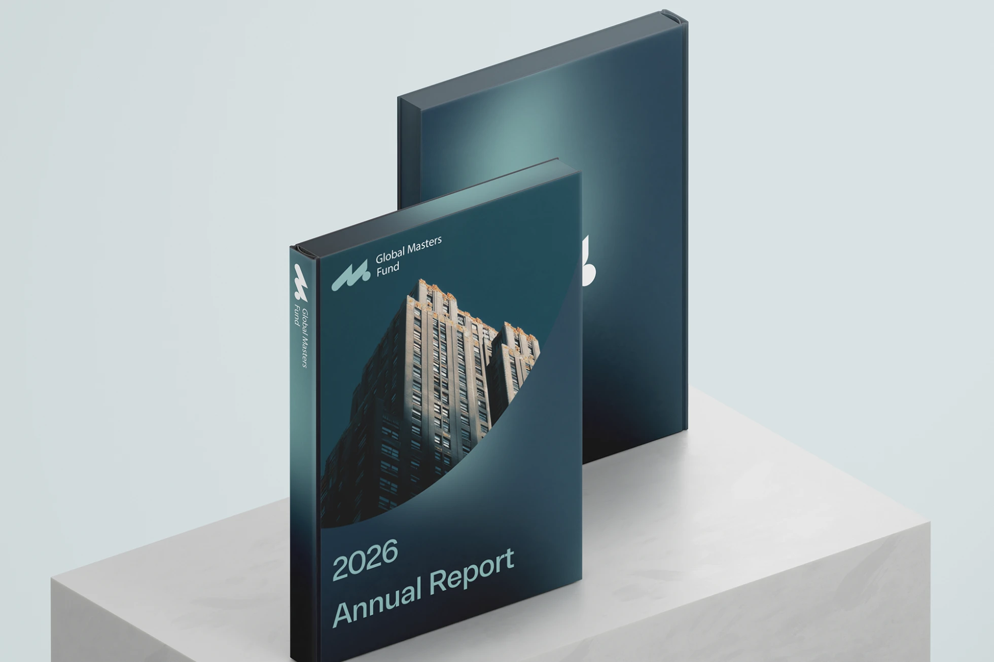 Two dark blue 2026 Annual Report booklets for Global Masters Fund with a skyscraper image on the cover, placed on a white marble pedestal.