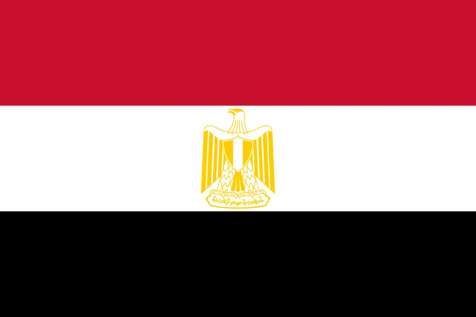 Flag of Egypt with horizontal red, white, and black stripes and a gold eagle emblem in the center.