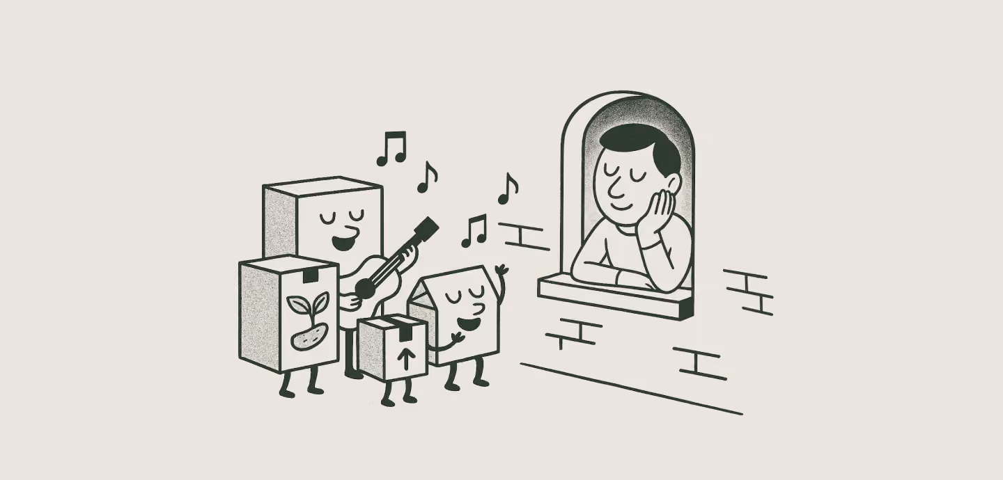 A line drawing of anthropomorphic cardboard boxes serenading a person at a window with an acoustic guitar and musical notes floating in the air.