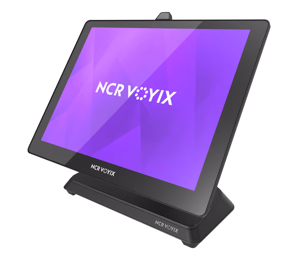 Black touchscreen monitor with purple screen displaying NCR Voyix logo on a stand.