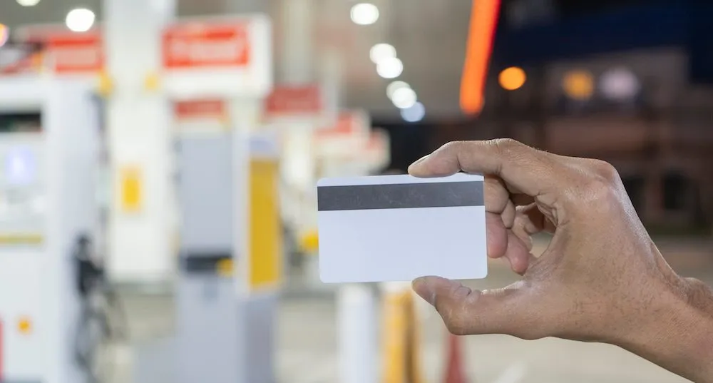 Credit card to make a payment for refueling car on gas station.