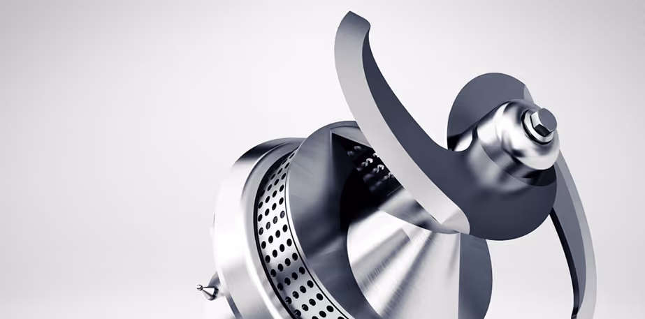 Close-up of a metallic blender blade attachment with sharp curved blades and perforated base.