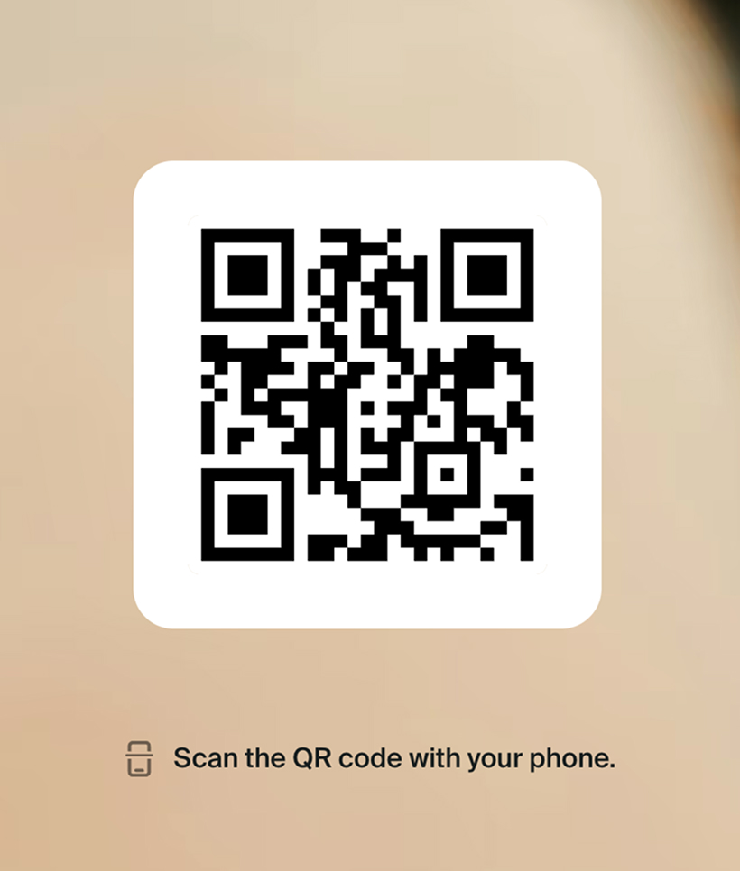 Black and white QR code on a rounded white square background with text below that says 'Scan the QR code with your phone.'