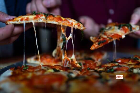 bright image of pizza slices being pulled from a pie