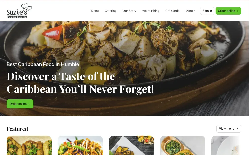 Suzie’s Fusion Cuisine website showing its Caribbean-food homepage and featured menu.