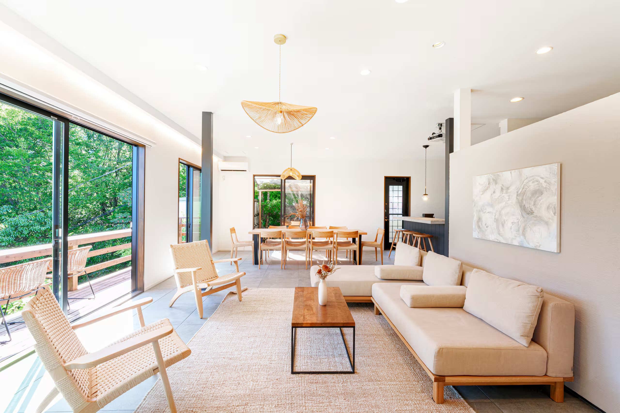Ocean view home in Atami surrounded by mountains and forest.