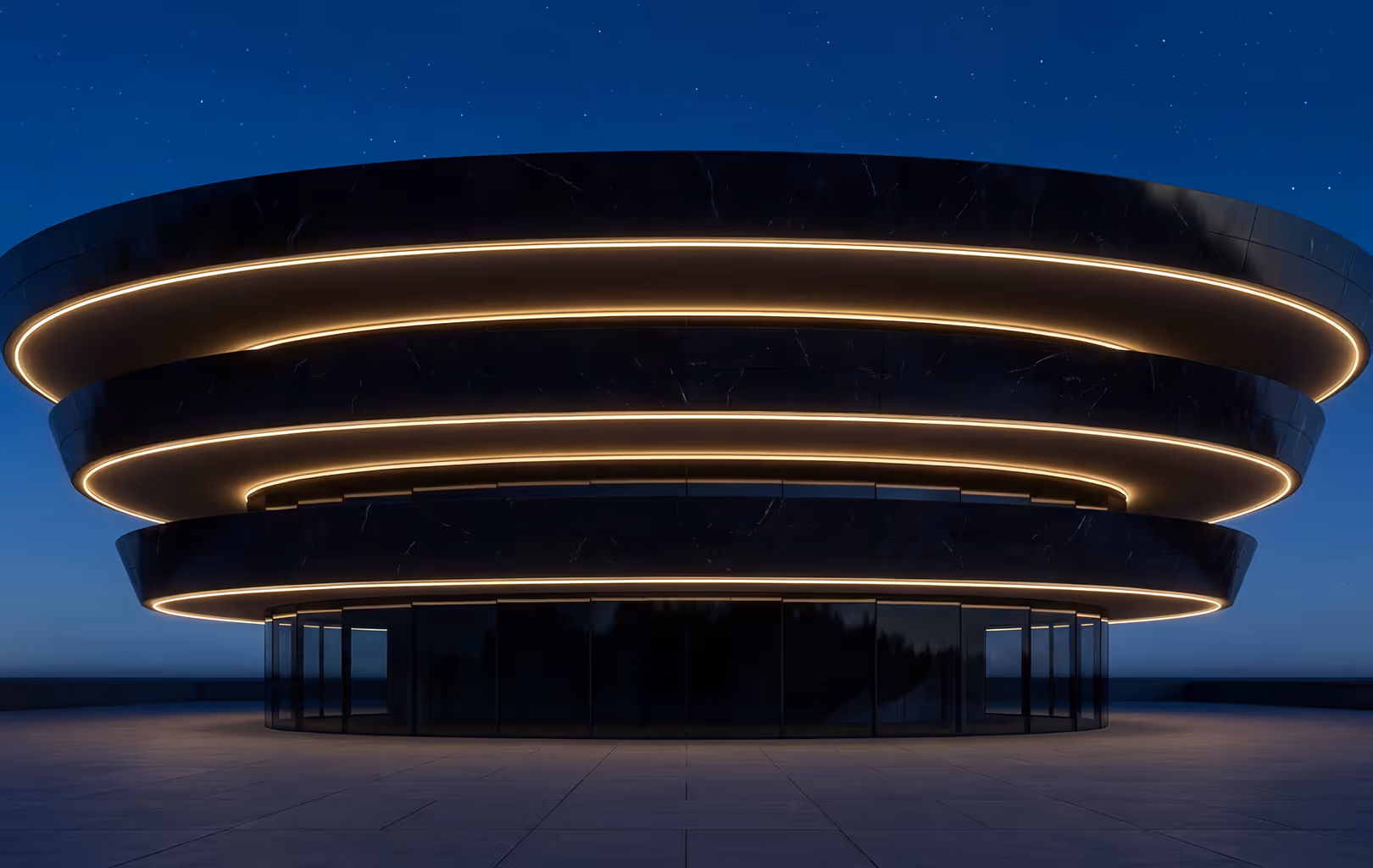 Modern, circular black building illuminated by horizontal yellow LED strip lights at night under a starry sky.