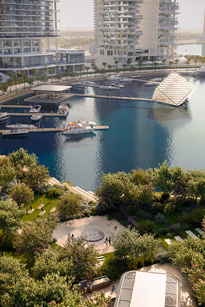 A large body of water surrounded by tall buildings.