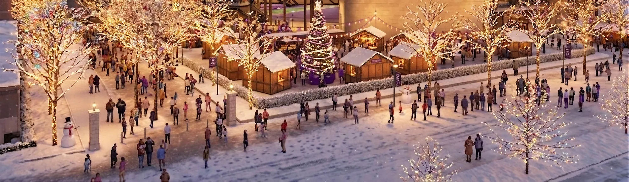 Holiday market stalls, a lit tree and glowing trees on the snowy plaza outside New Ryan Field