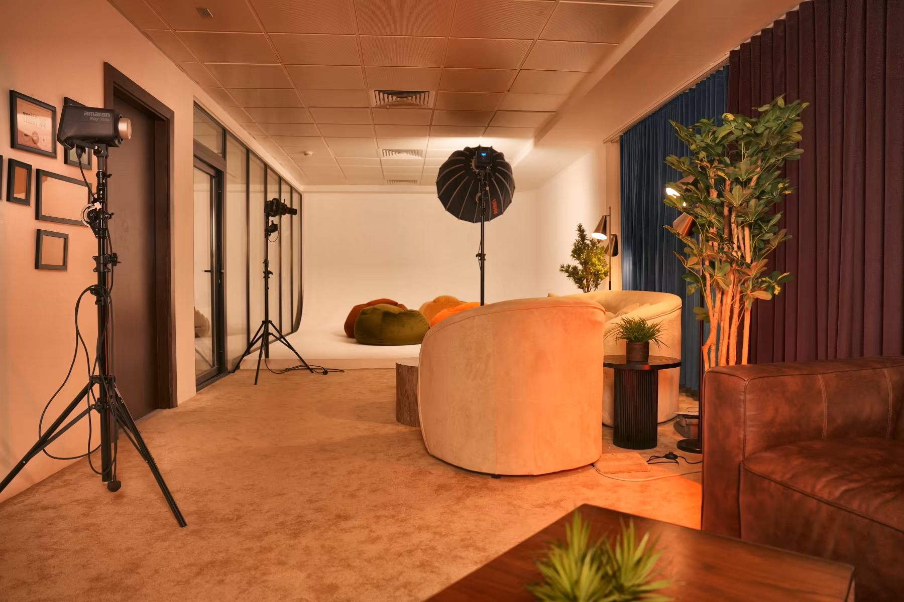 Wide view of Ottora Studio's main floor in Doha, with the studio setups and lighting in place