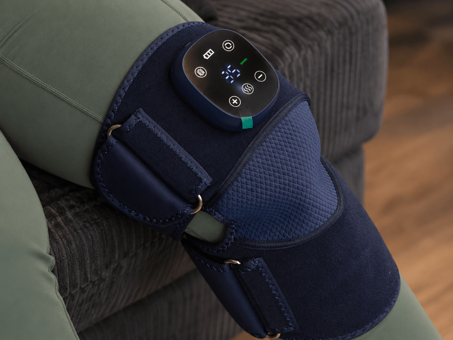Oasis Heated Knee Massager controller showing the selected heat setting