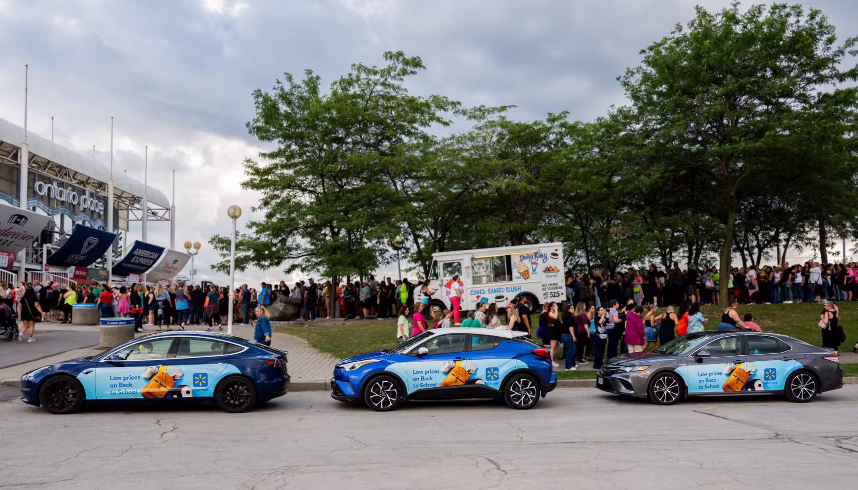 A fleet of Walmart vehicle SWARMing a festival