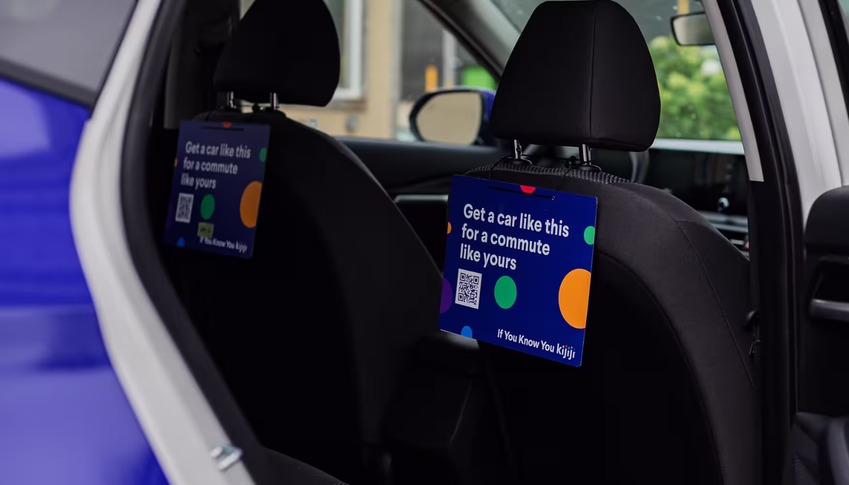Kijiji display card inside rideshare vehicle