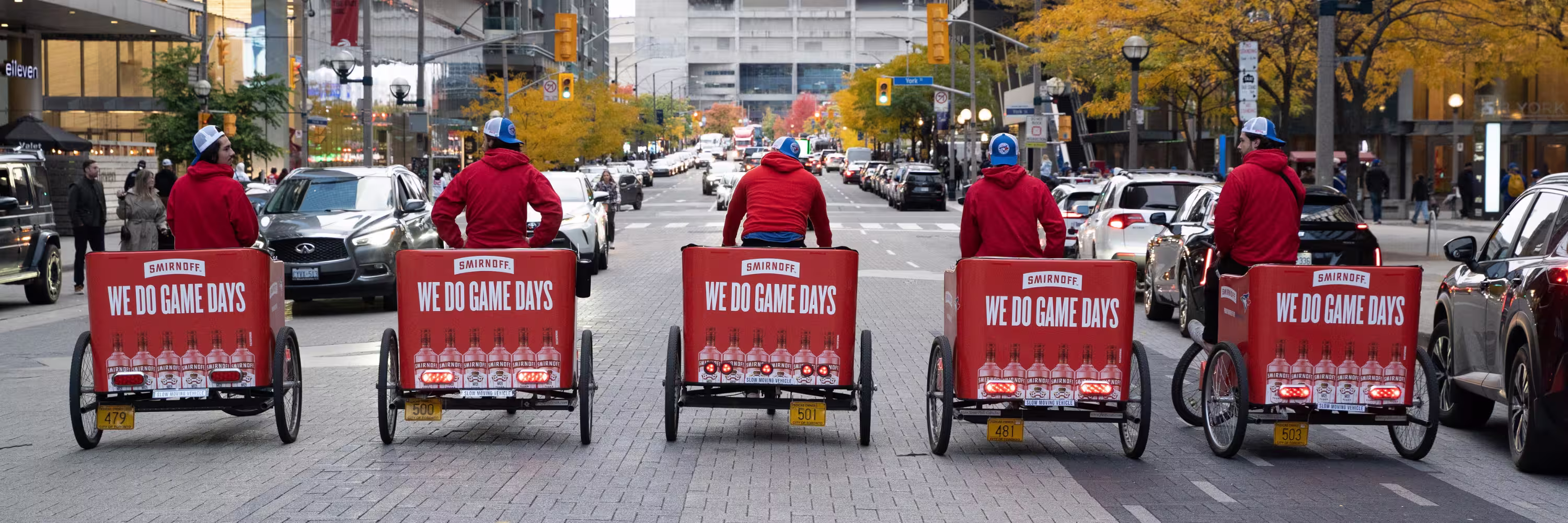 Fleet of Smirnoff-wrapped Pedicabs in Toronto