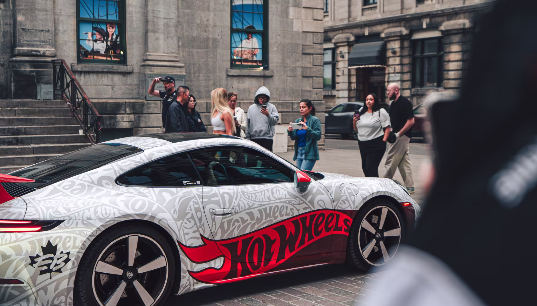 Wrapped vehicle driving past a medical conference