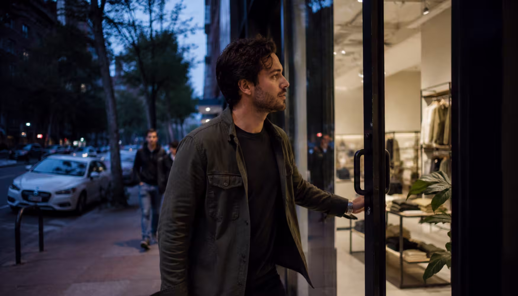 Man walking into a retail store