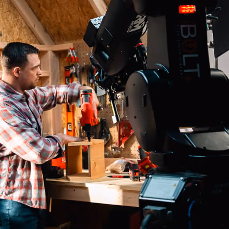 Bolt Jr+ on track filming a tv commercial for a fast food burger chain