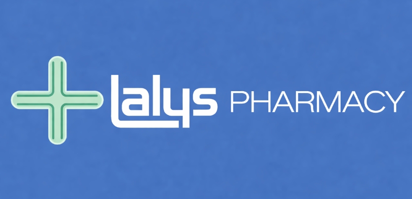 Lalys Pharmacy logo with a green medical cross on a blue background.