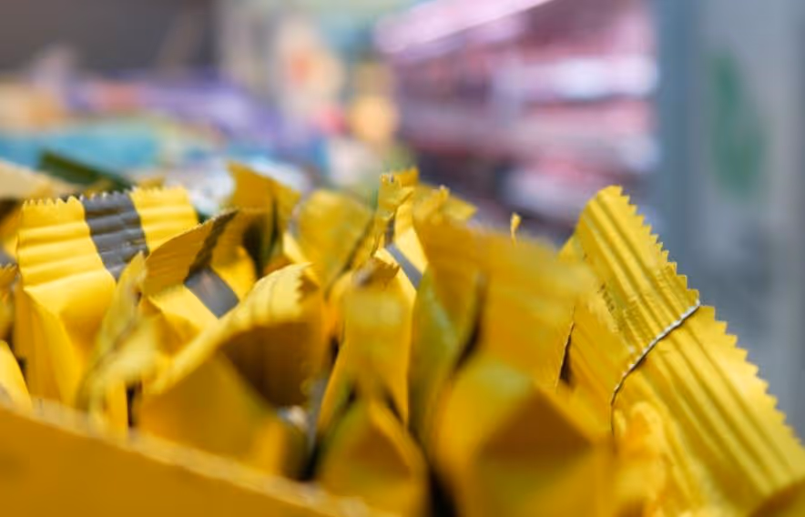 Yellow packets in bins