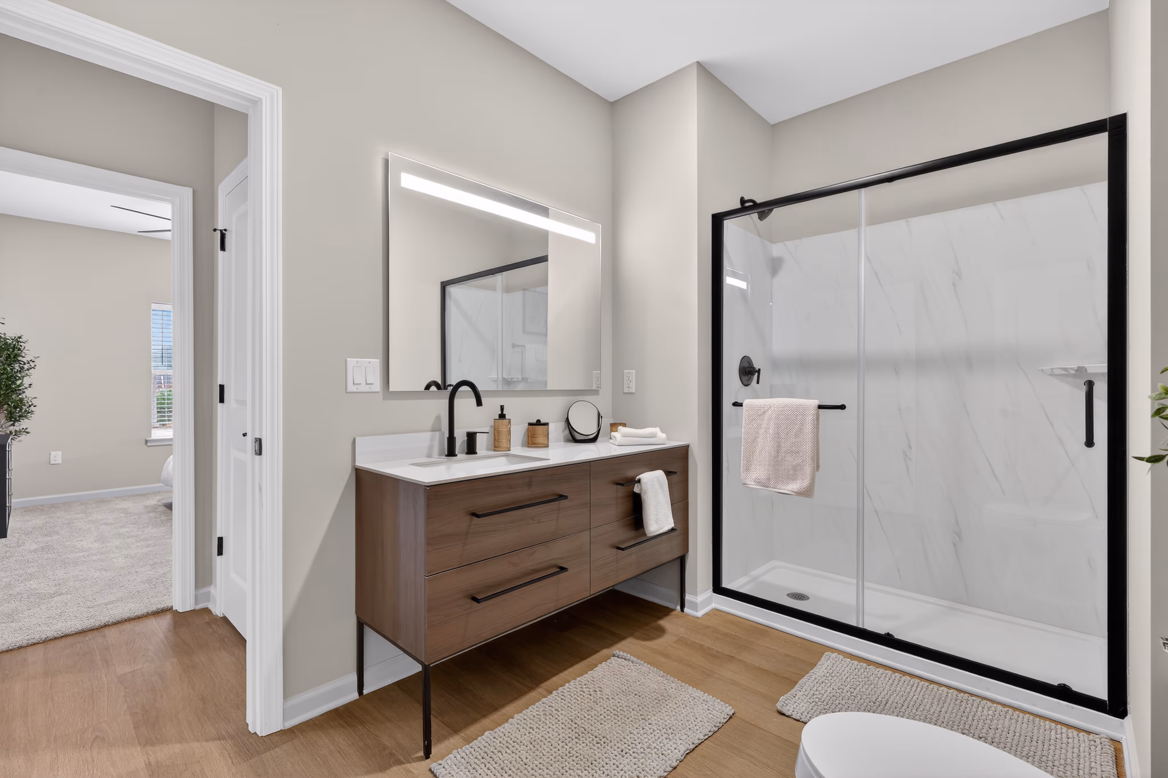 Bathroom with brown cabinets