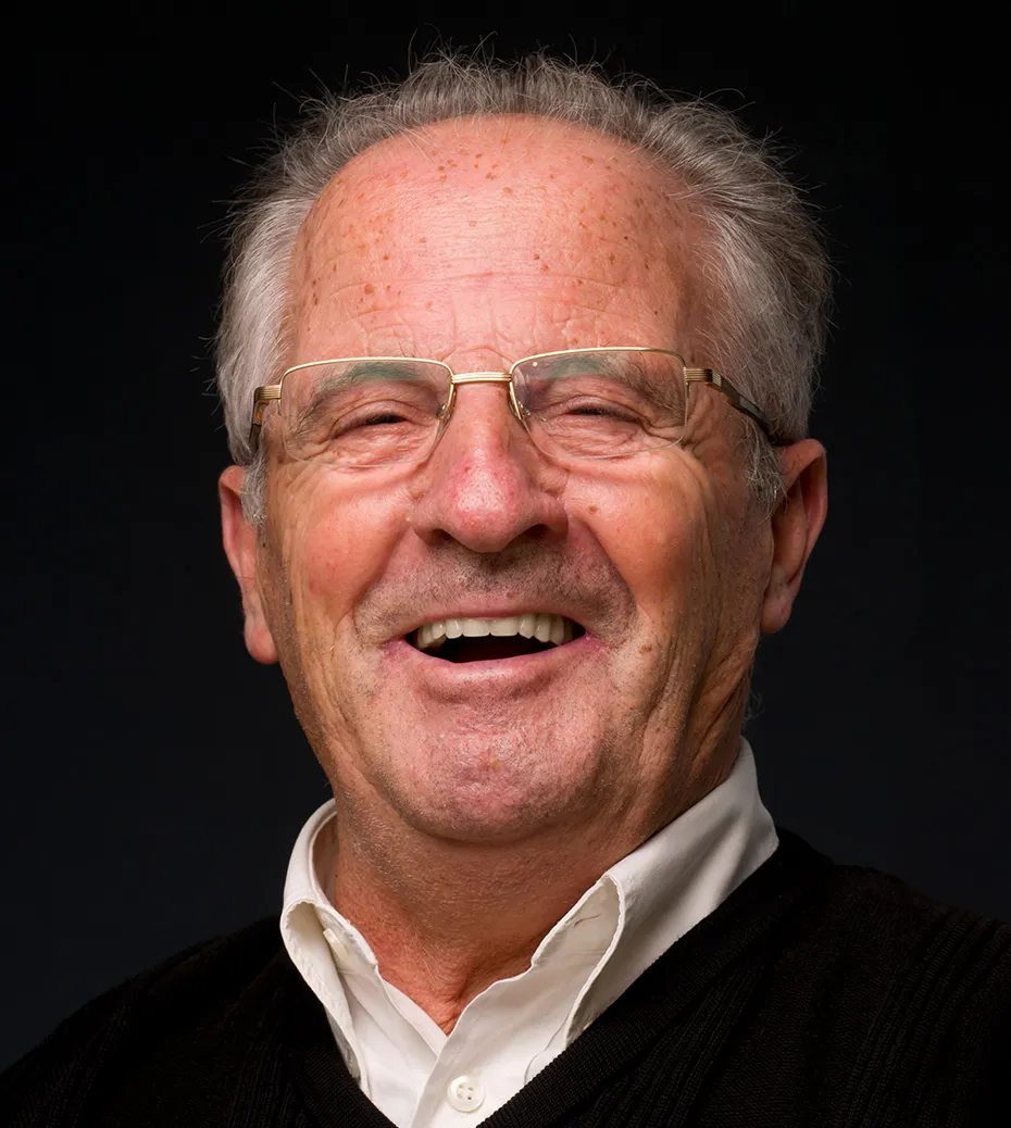 portrait of elderly man with dentures smiling