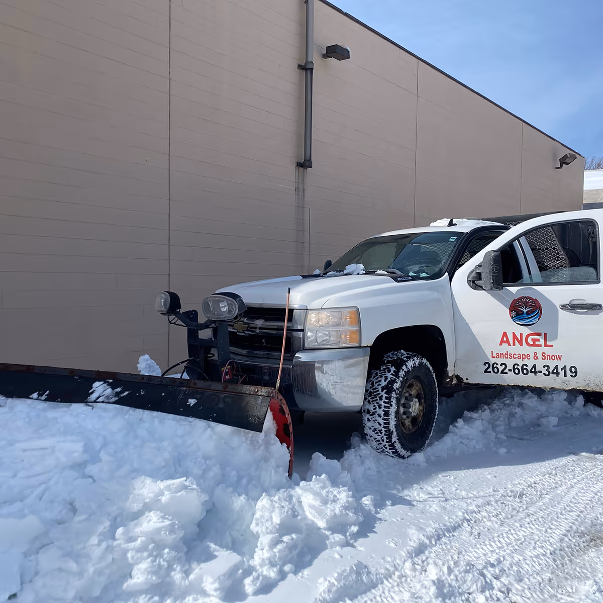 Sidewalk shoveling and winter snow clearing services