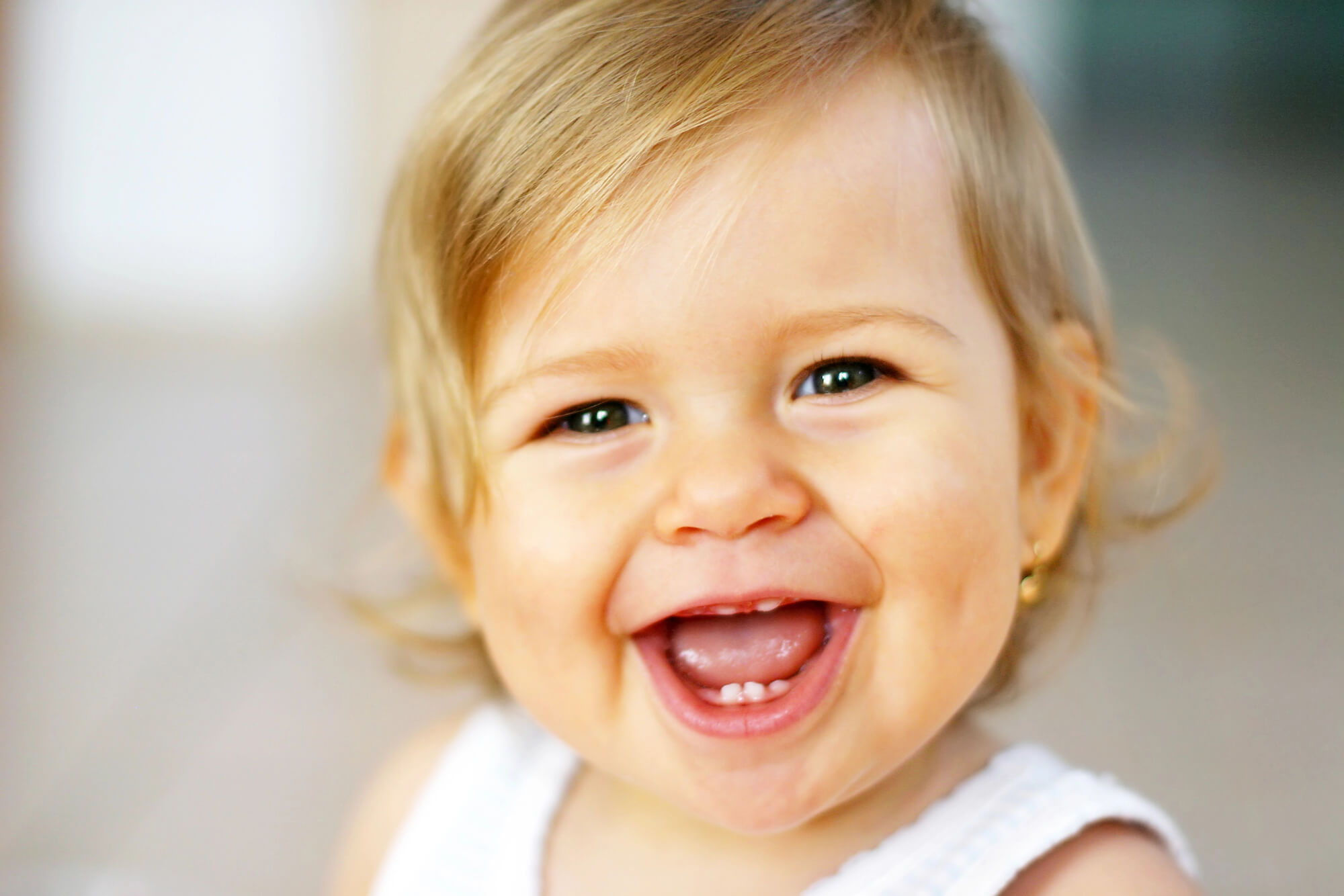 a baby smiling at the Dentist in Butler NJ