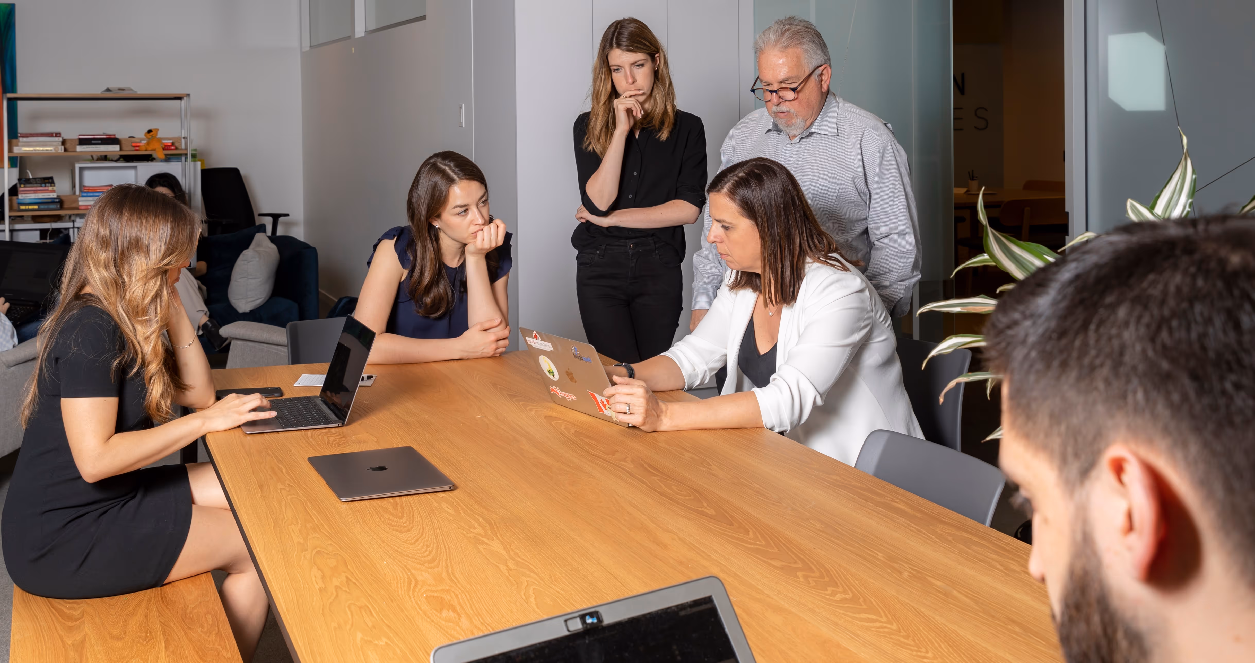 The Brio team sitting around a table