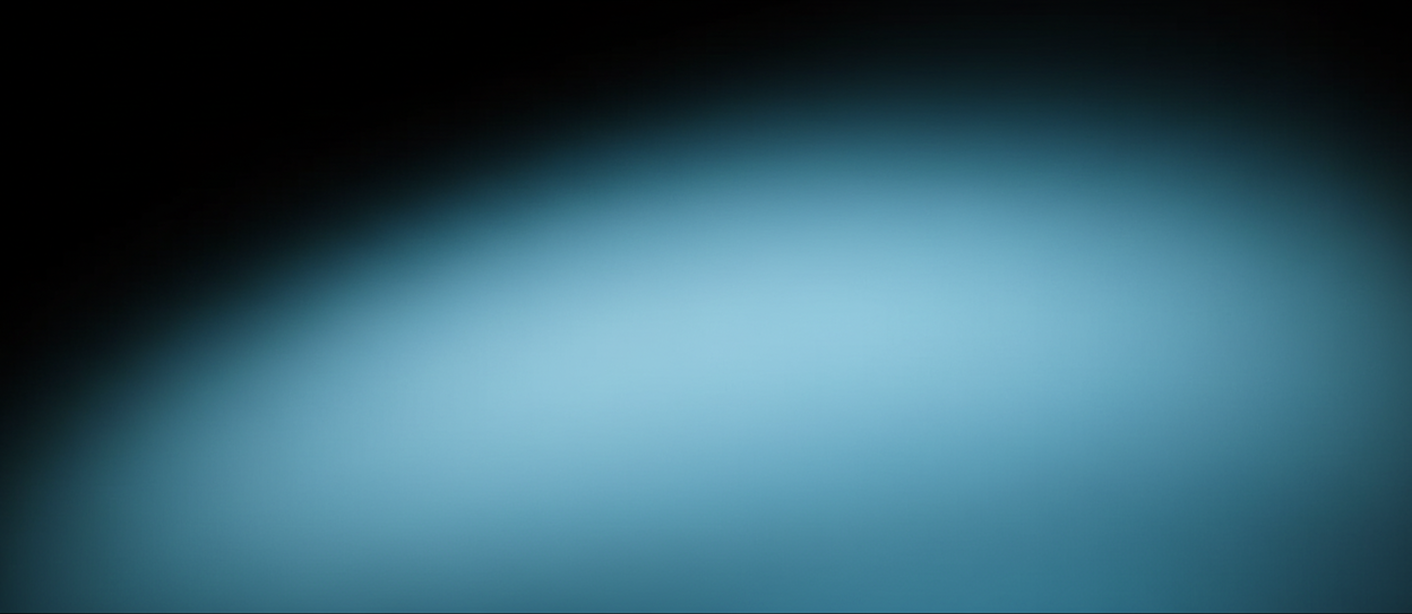 Gradient background transitioning from dark black to bright orange.