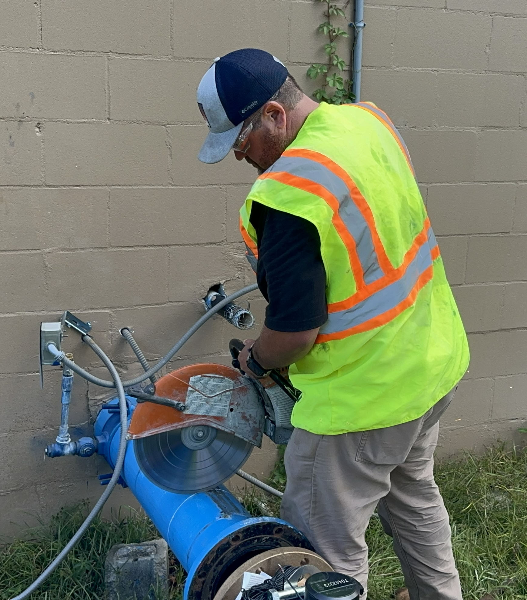 M&E Construction crew working on a large water meter installation