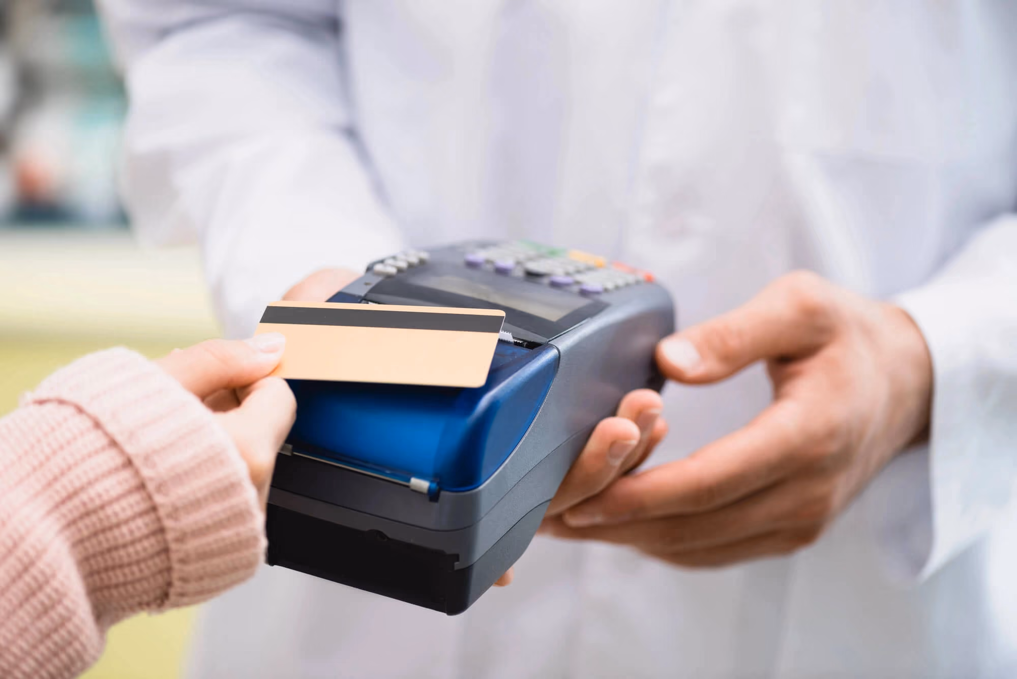 person paying with a credit card