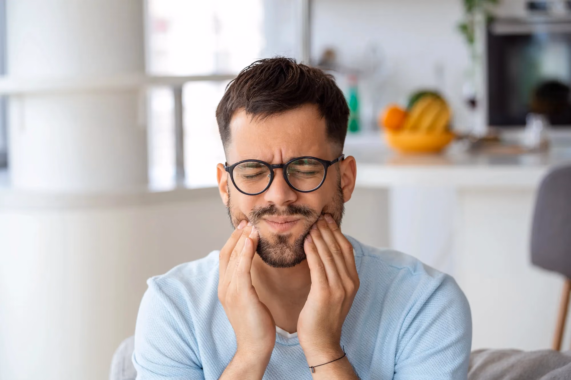 man with dental pain