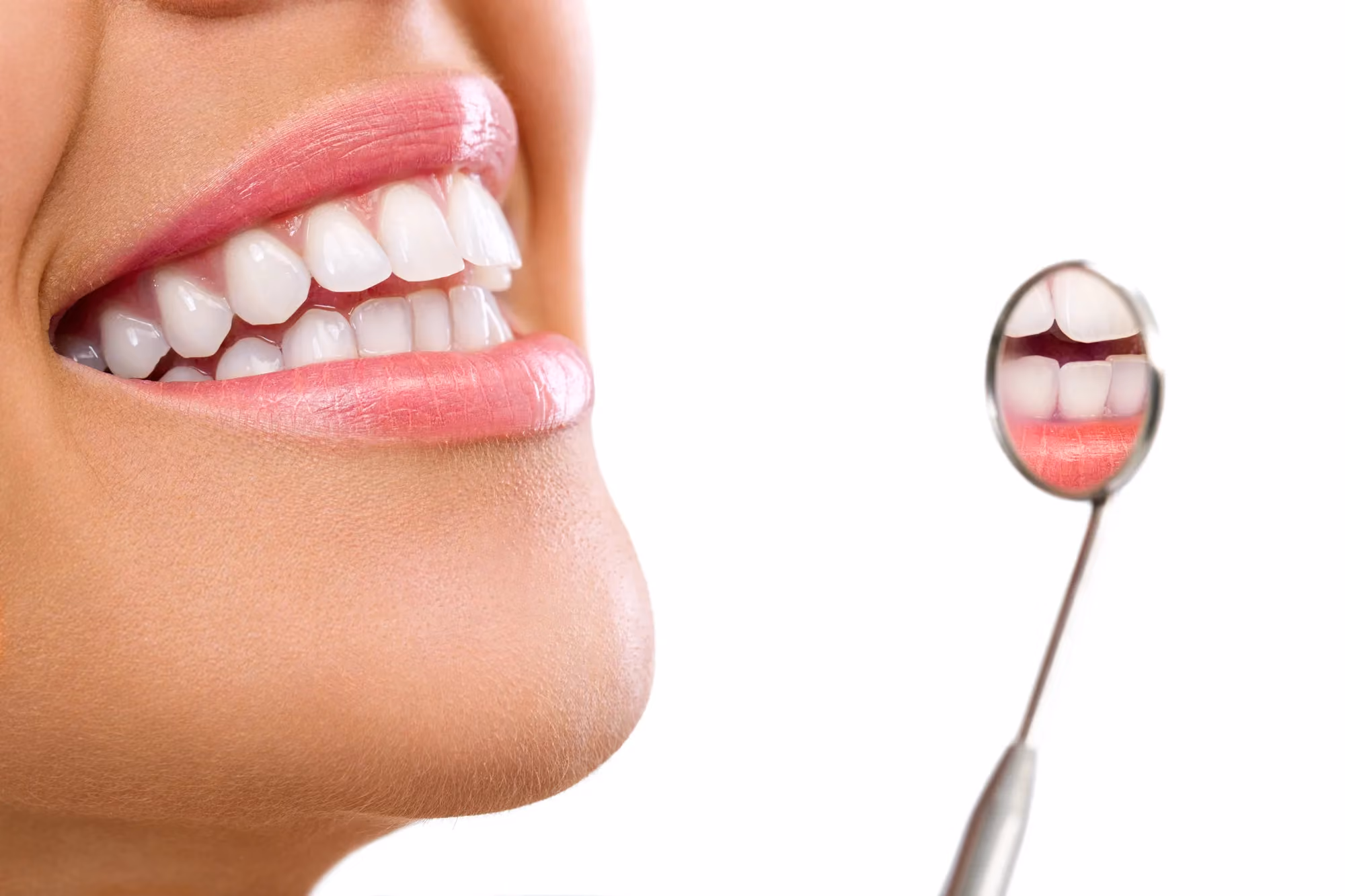 Woman smiling near dental tools